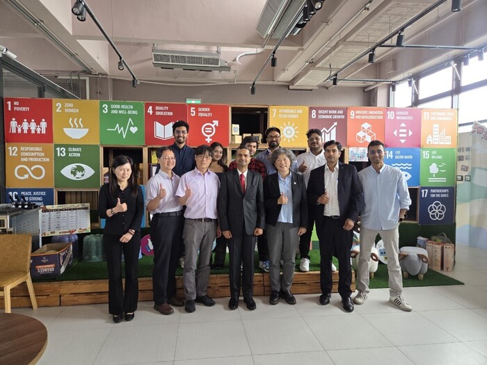 Group photo of the India Taipei Association delegation with NDHU faculty members and students following an exchange session.